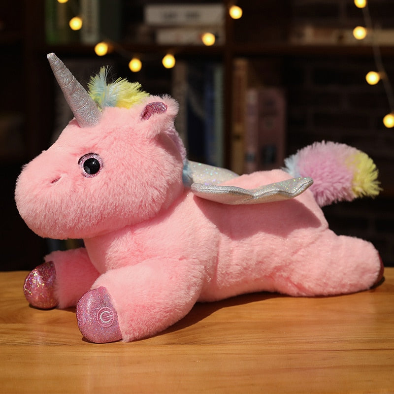 Unicórnio de pelúcia com luz brilhante