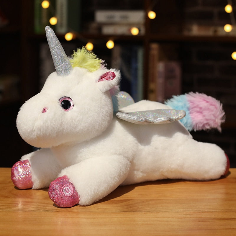 Unicórnio de pelúcia com luz brilhante