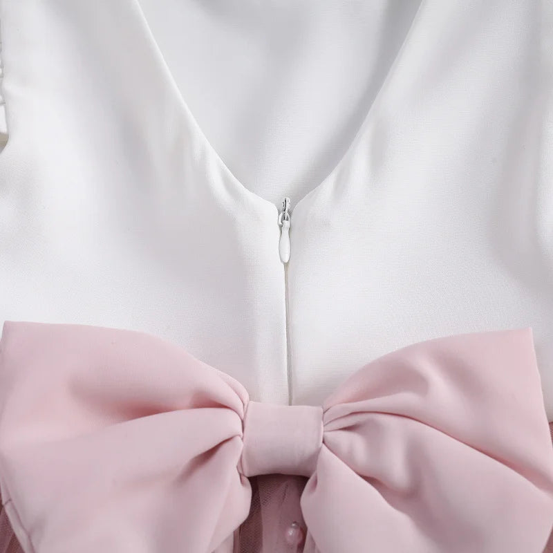 Vestido com Laço Rosa - 9 meses a 5 anos