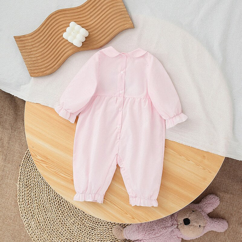 Macacão Rosa Com Detalhes Bordados 3 a 18 meses