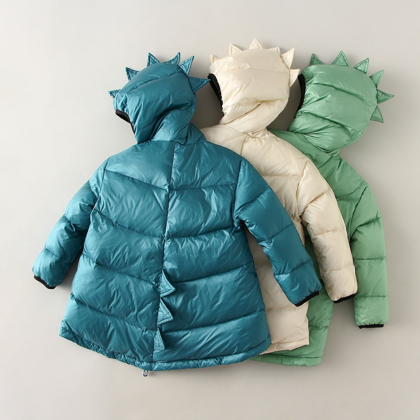 Casaco infantil de inverno com capuz e detalhe nas costas de dinossauro - 1 a 6 anos